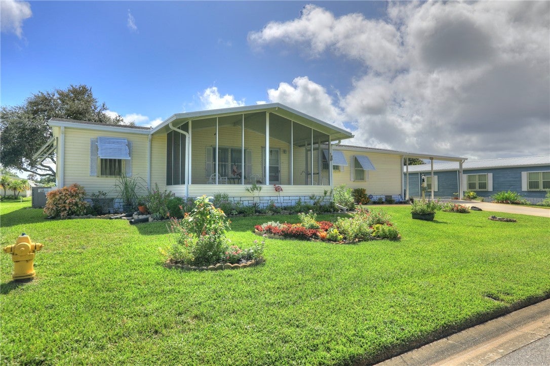 233 Kiwi Dr, Barefoot Bay, FL 32976 photo