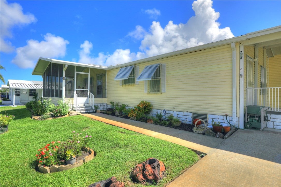 233 Kiwi Dr, Barefoot Bay, FL 32976 photo