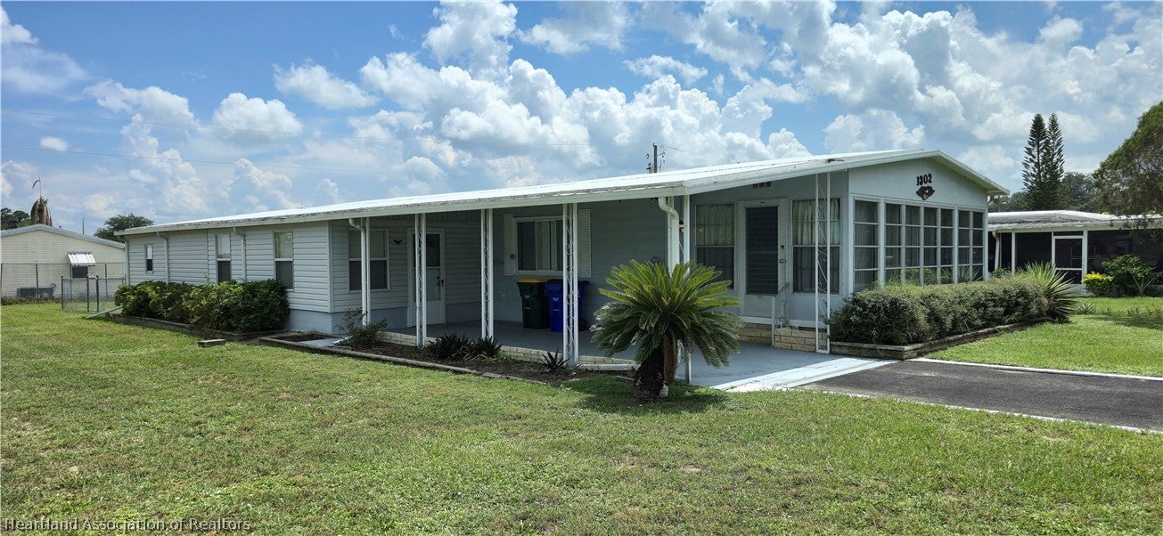1302 Wightman Ave, Sebring, FL 33870 photo