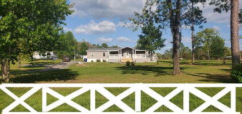 Mobile Home in Other City - Not In The State Of Florida US 5351 NE 121st Terrace.jpg