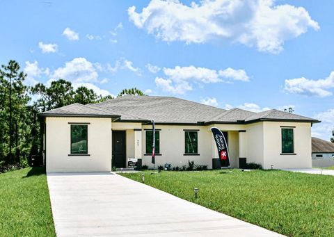 Single Family Residence in Lehigh Acres FL 2416 N Xelda Avenue.jpg