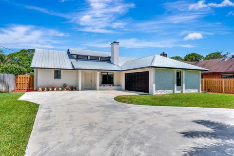Single Family Residence in Jupiter FL 18975 SE County Line Road.jpg