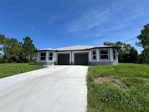 Duplex in Lehigh Acres FL 11-13 E 12th St.jpg