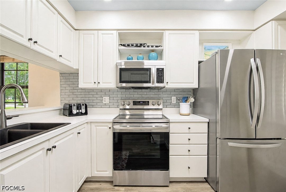 106 Pebble Bch #14751 HOLE IN 1 CIRCLE, Fort Myers, FL 33919 photo