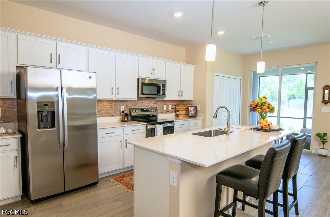 2433 Avocado Ln, Naples, FL 34120 photo