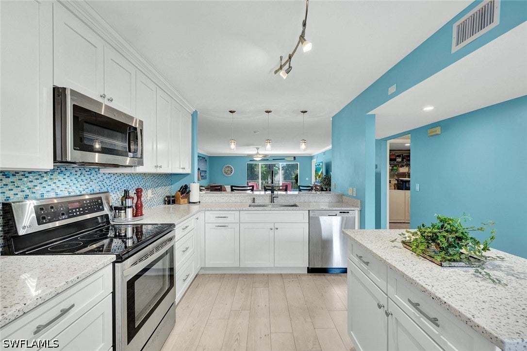 3072 Sandpiper Bay Cir, Naples, FL 34112