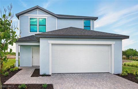 Single Family Residence in Lehigh Acres FL 608 Oasis Lake Place.jpg
