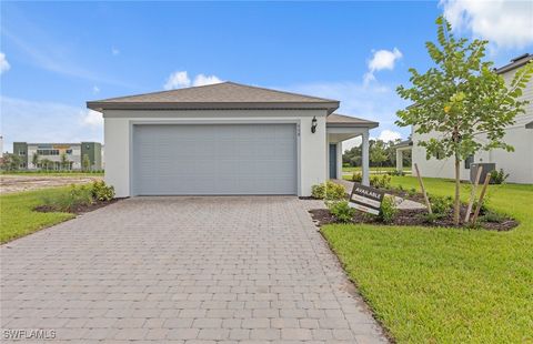 Single Family Residence in Lehigh Acres FL 608 Lakeside Oasis Avenue.jpg