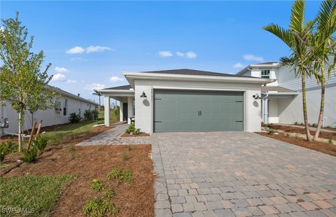 Single Family Residence in Lehigh Acres FL 600 Oasis Lake Place.jpg