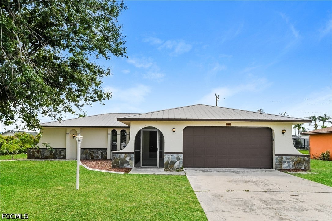 3411 SW 6 Pl, Cape Coral, FL 33914 photo