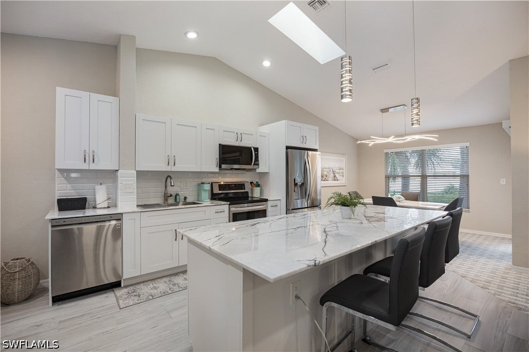 290 Emerald Bay Cir, Naples, FL 34110