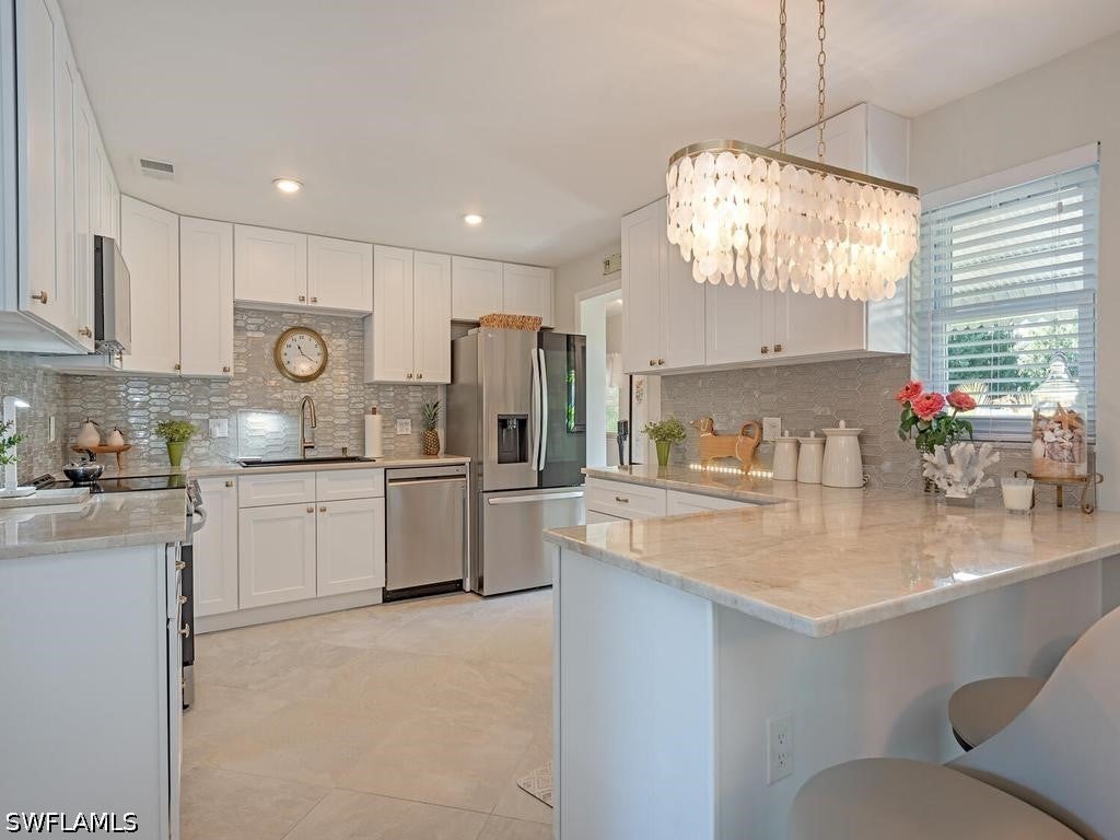 23 Knights Bridge Rd, Naples, FL 34112