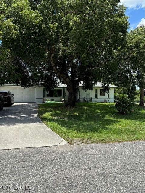 Single Family Residence in Lehigh Acres FL 1108 Robert Avenue.jpg