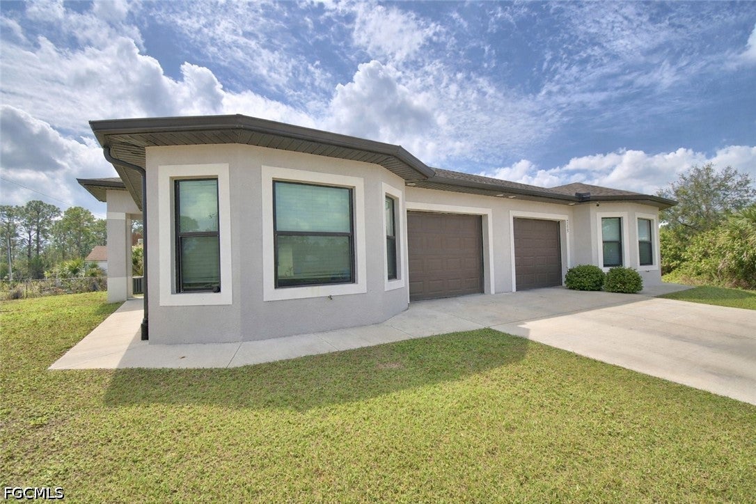 713 715 W 12 St, Lehigh Acres, FL 33972 photo