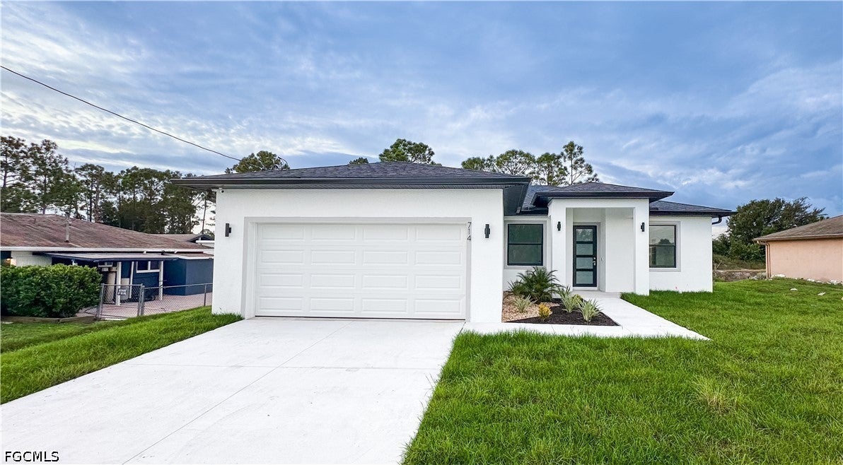 714 Carbon St, Lehigh Acres, FL 33974