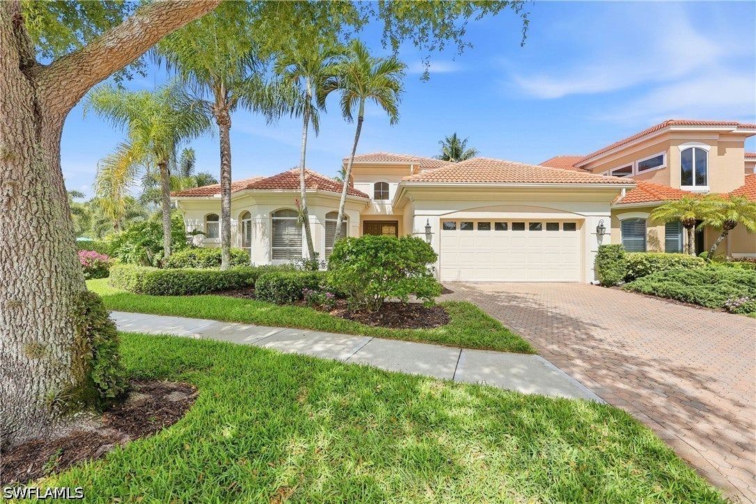 9227 Troon Lake Dr, Naples, FL 34109 photo