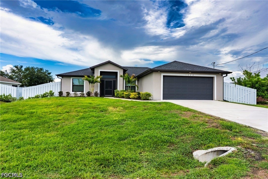 1028 Champion Ave, Lehigh Acres, FL 33971 photo