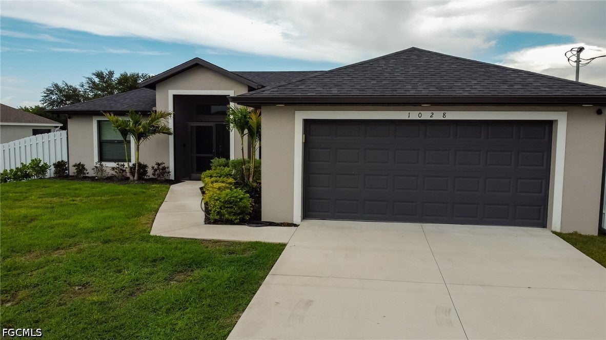 1028 Champion Ave, Lehigh Acres, FL 33971 photo