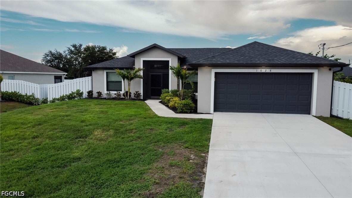 1028 Champion Ave, Lehigh Acres, FL 33971 photo