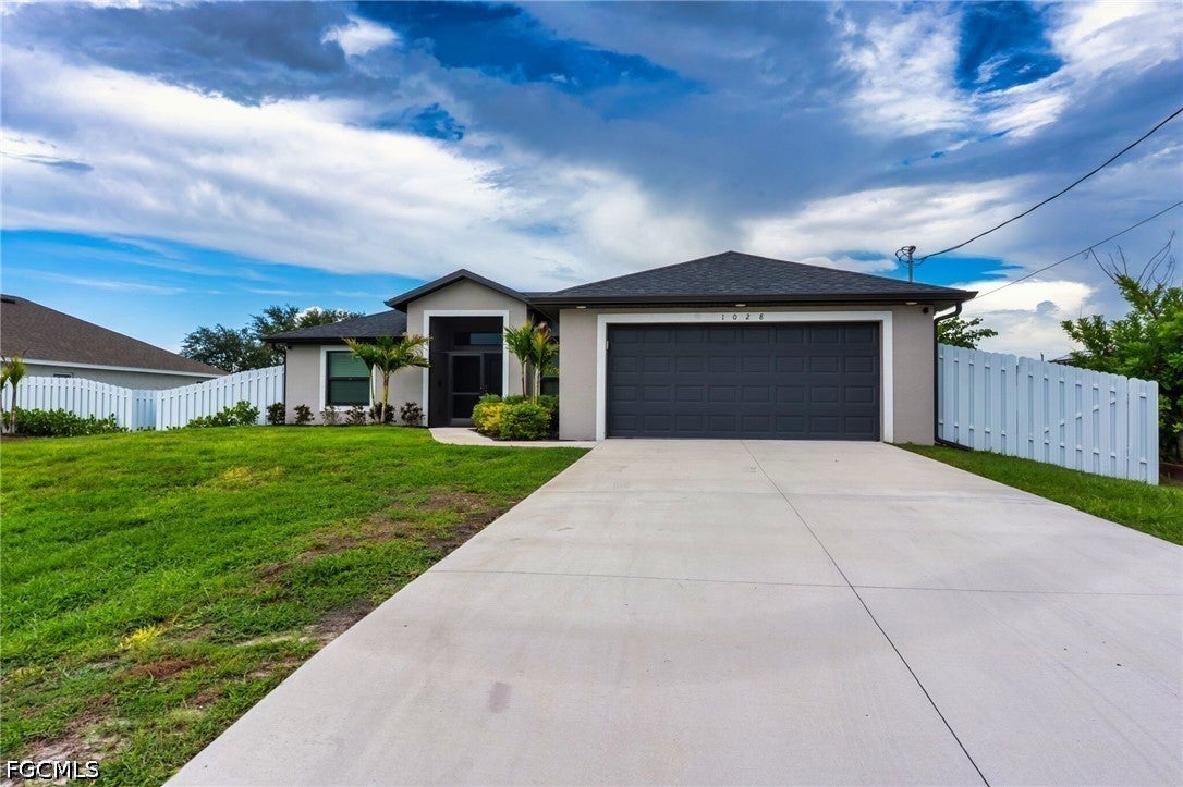 1028 Champion Ave, Lehigh Acres, FL 33971 photo