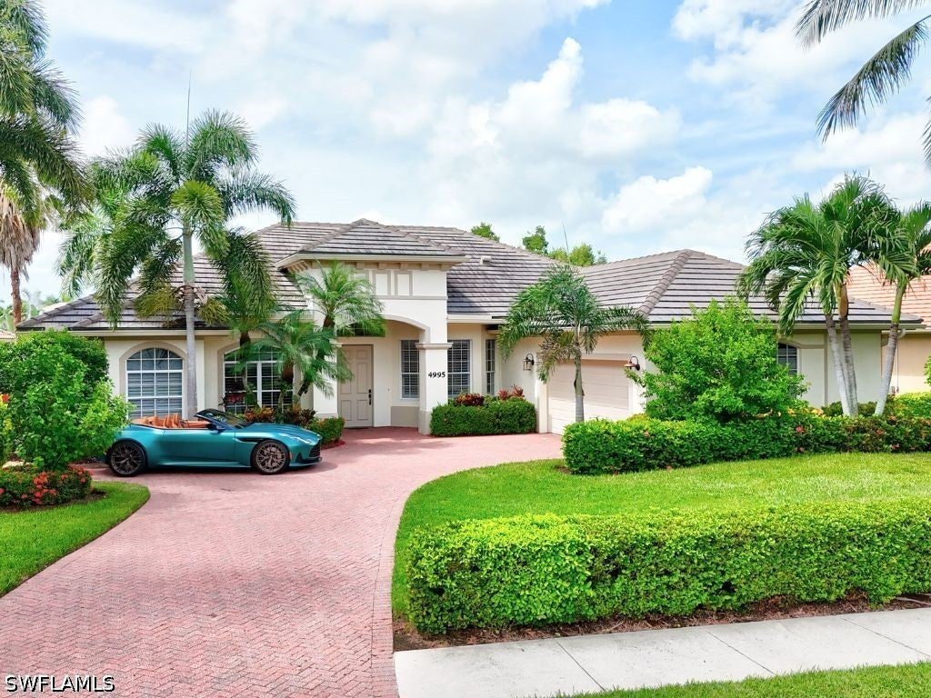 4995 Rustic Oaks Cir, Naples, FL 34105 photo