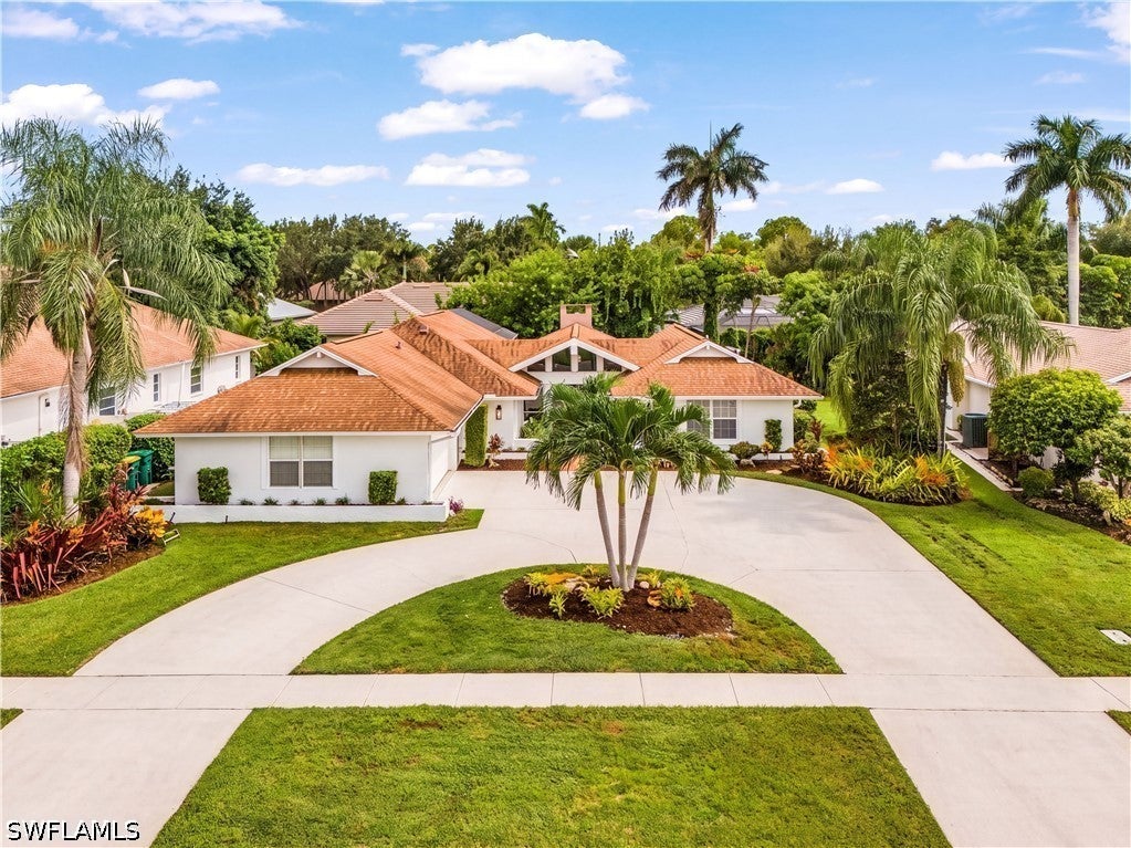 2472 Pine Woods Cir, Naples, FL 34105