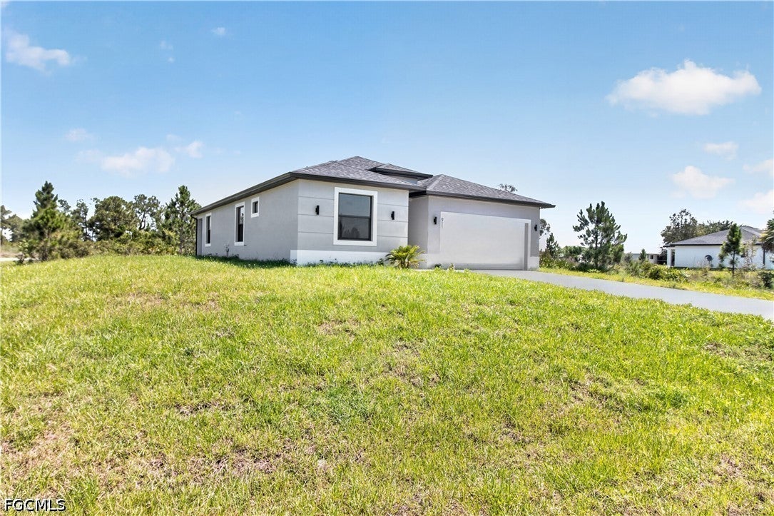 911 Panda Dr, Lehigh Acres, FL 33974 photo