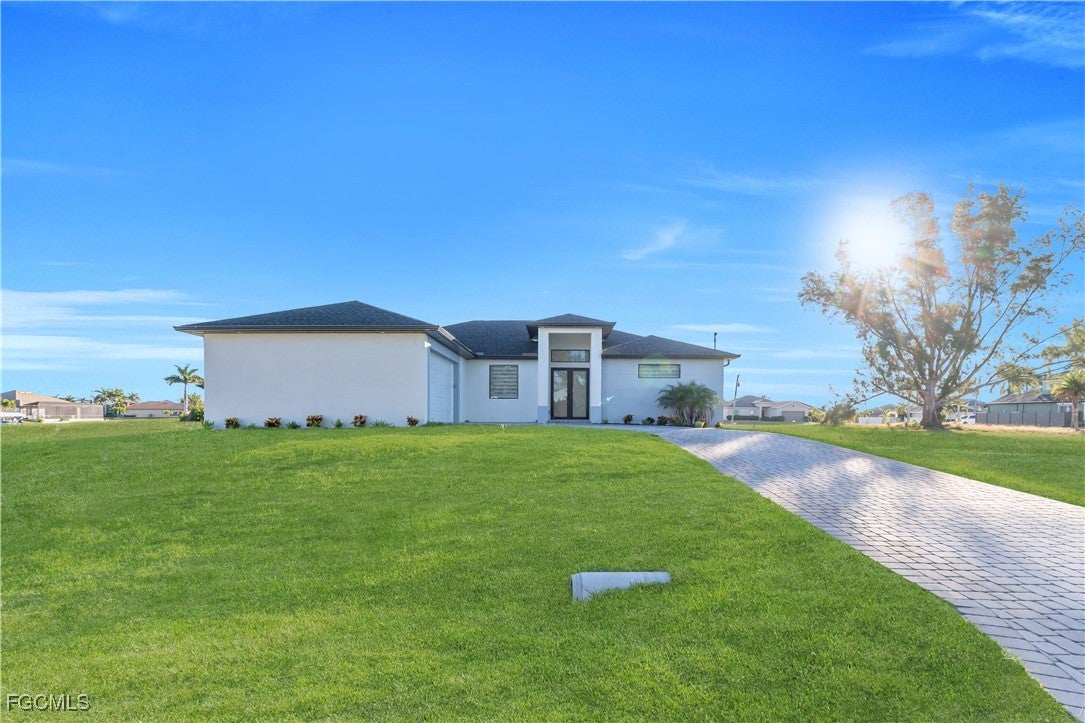 911 NW 37 Pl, Cape Coral, FL 33993 photo