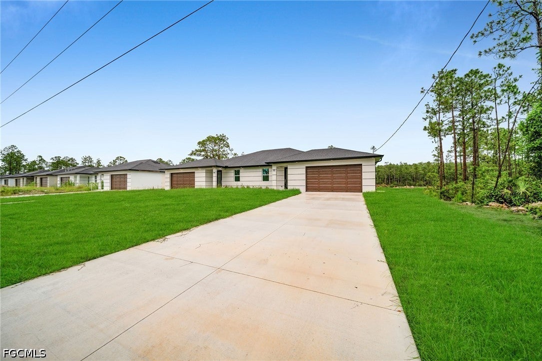 312 314 Urbana St, Lehigh Acres, FL 33972 photo