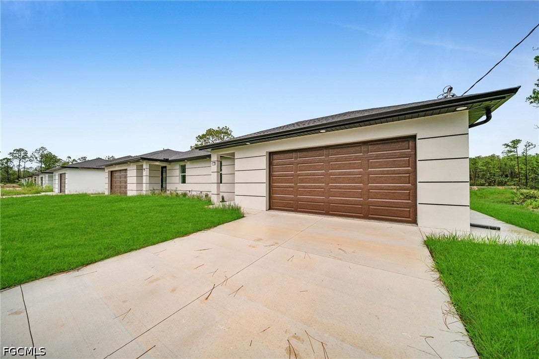 312 314 Urbana St, Lehigh Acres, FL 33972 photo