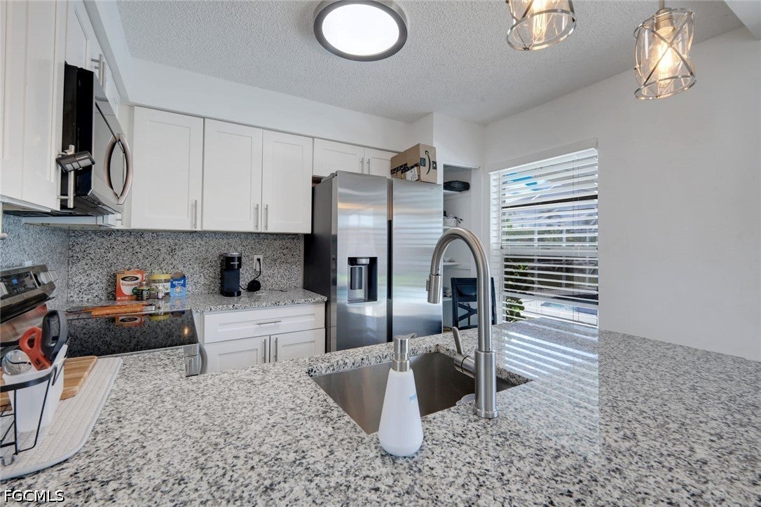 1307 SW 43 Ln, Cape Coral, FL 33914 photo