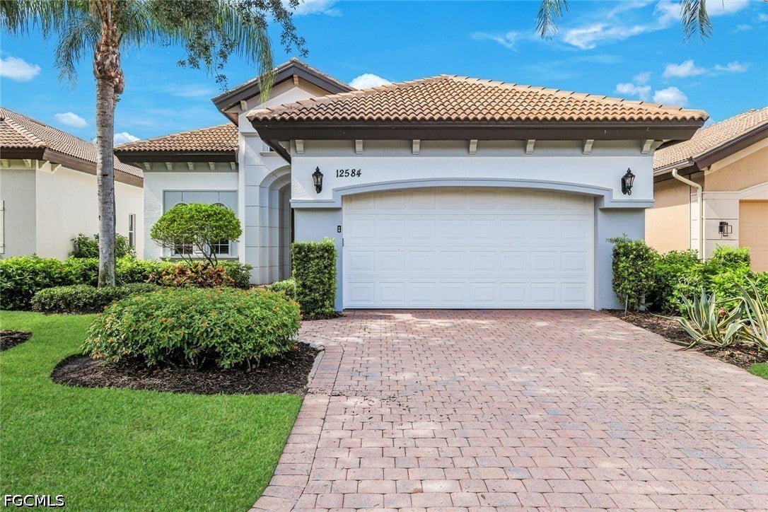 12584 Grandezza Cir, Estero, FL 33928 photo