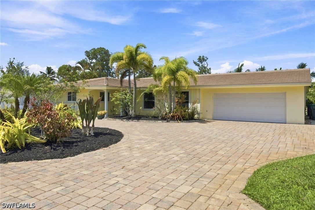64 Pebble Beach Blvd, Naples, FL 34113