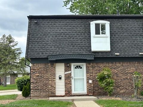 Condominium in Belleville MI 41102 N Woodbury Green Drive.jpg