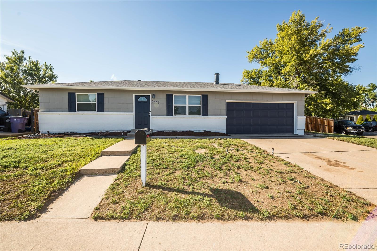 5553 Yost Ct, Denver, CO 80239 photo