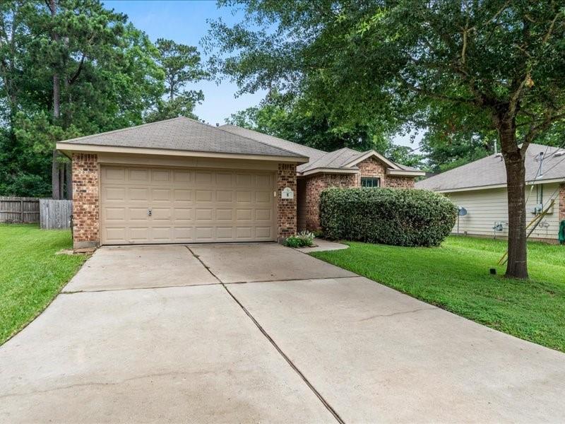8 Shady Oak Ln, Conroe, TX 77304 photo