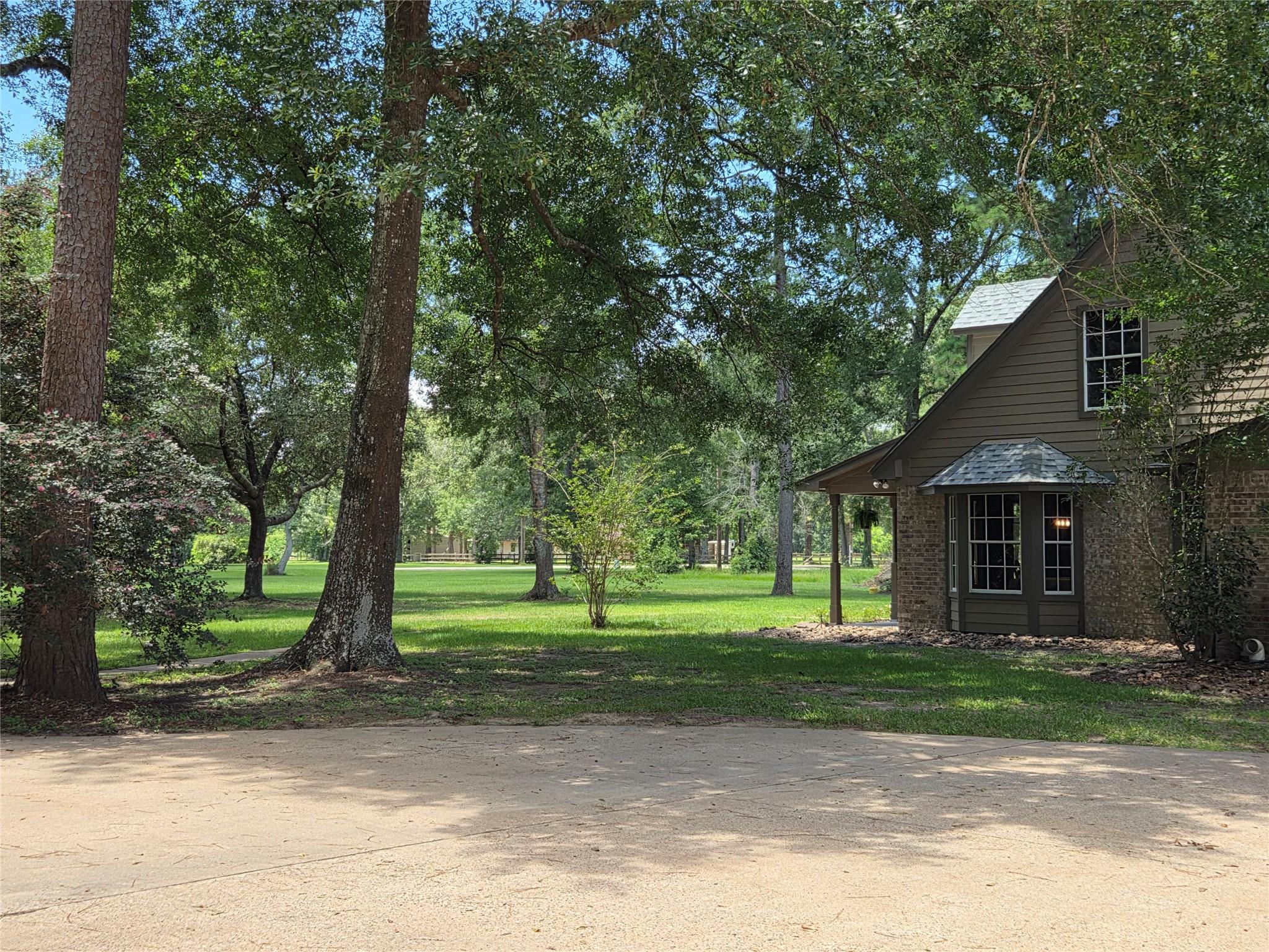 26815 E Fm 2090 Rd, Splendora, TX 77372 photo