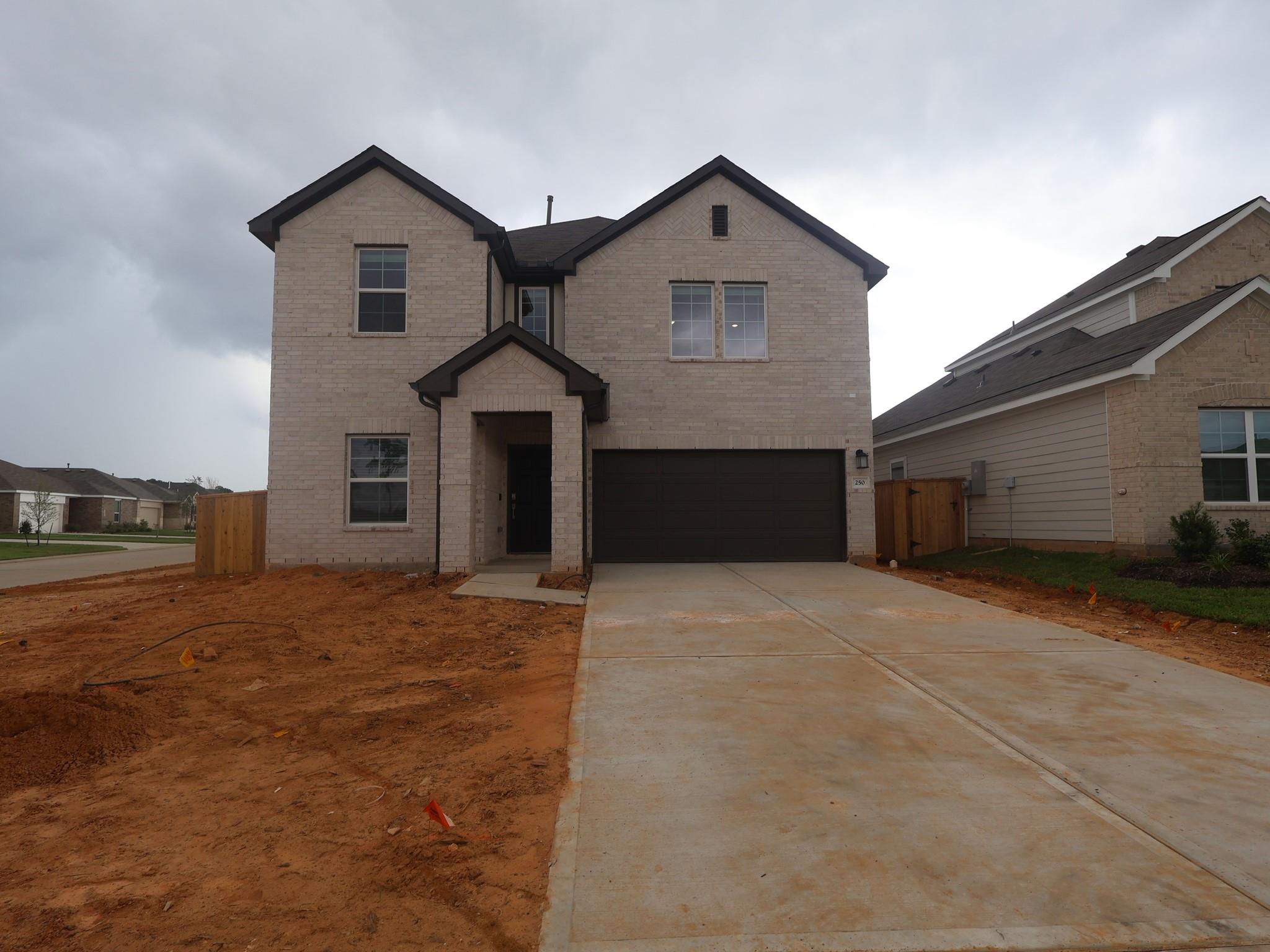 250 Draper Shadows Dr, Willis, TX 77378