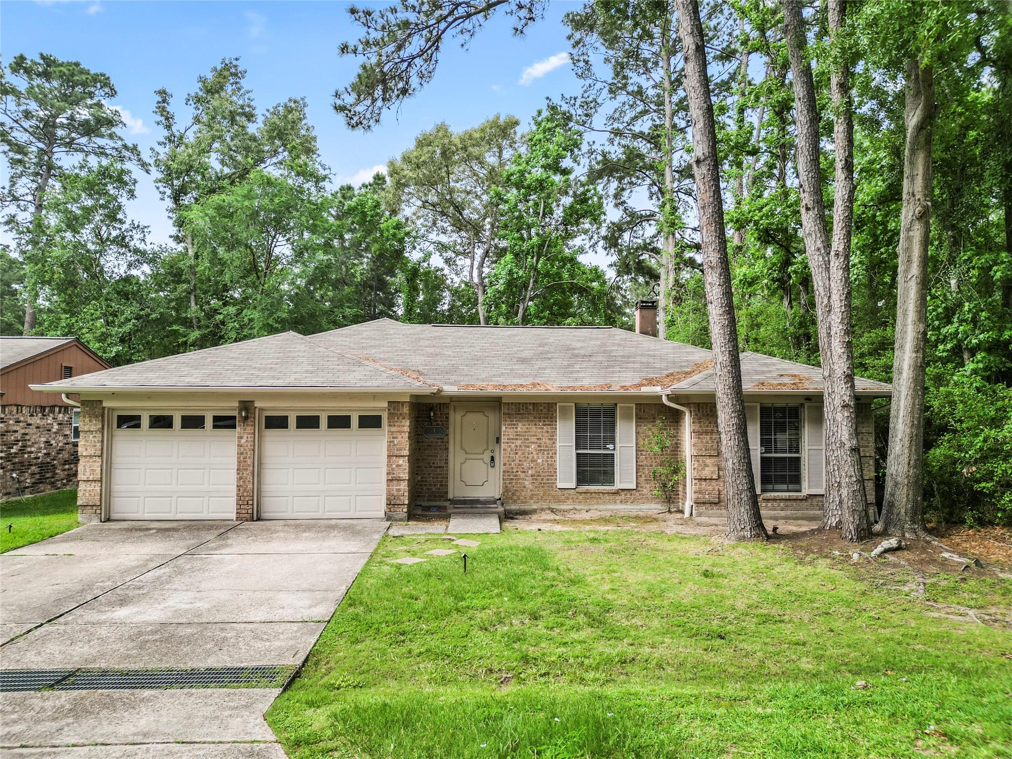 1 Woodtimber Ct, Spring, TX 77381