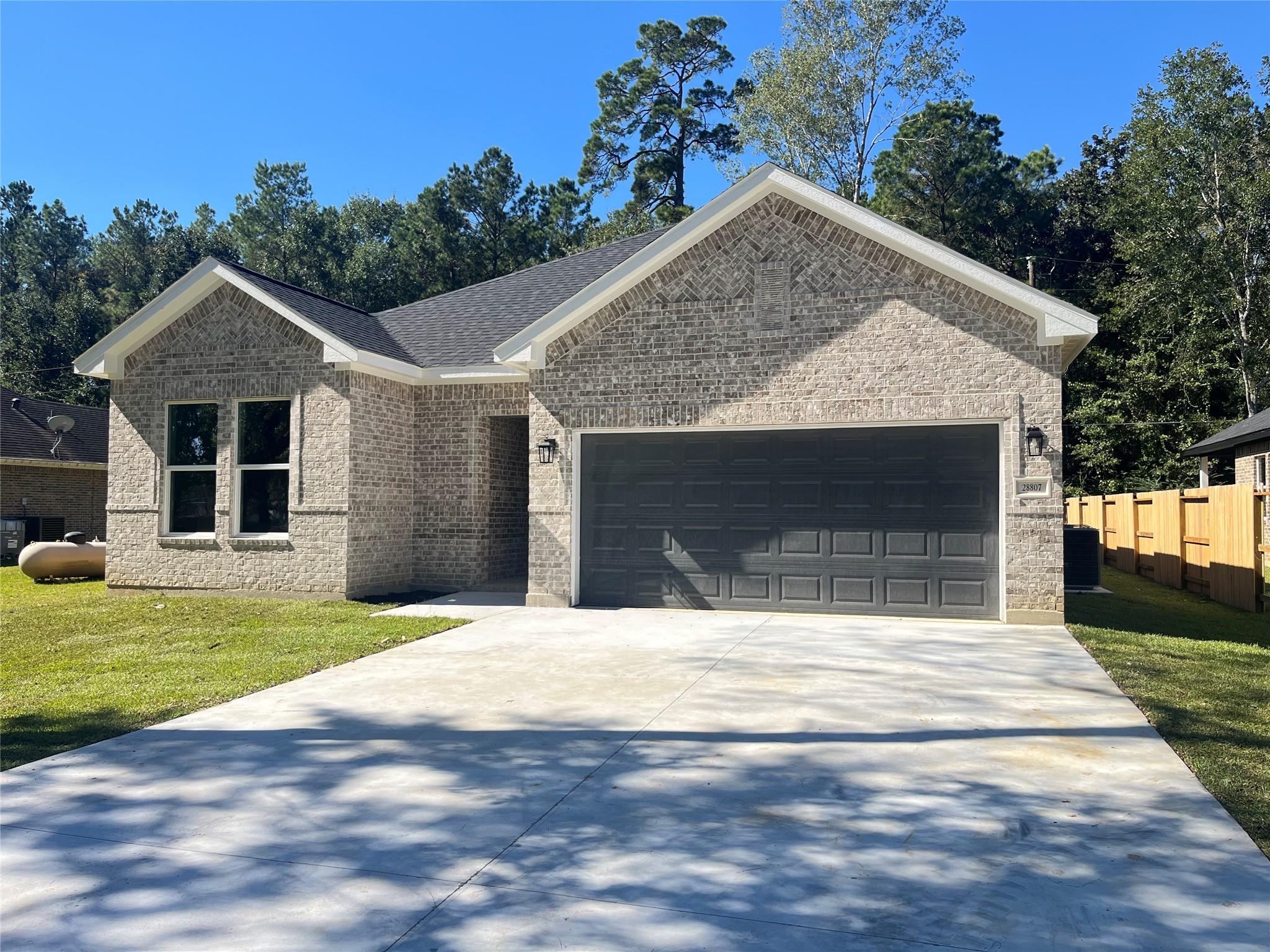 28807 Champion Oaks Dr, Magnolia, TX 77354