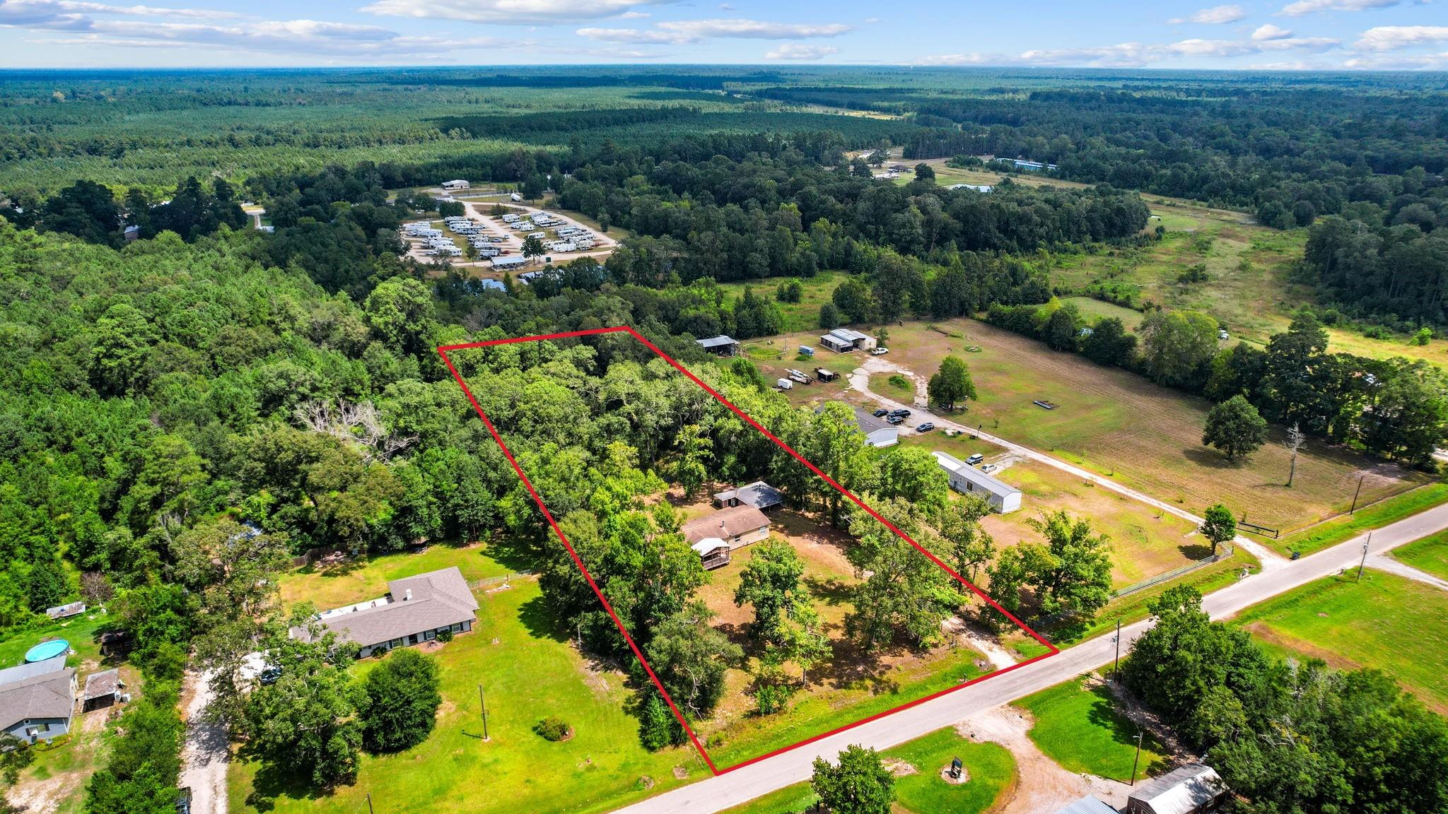 863 County Road 3141 E, Cleveland, TX 77327 photo