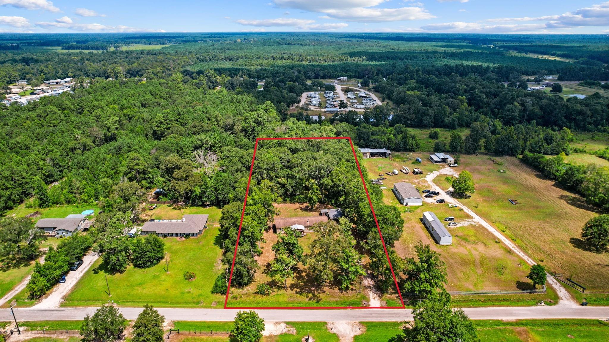863 County Road 3141 E, Cleveland, TX 77327 photo