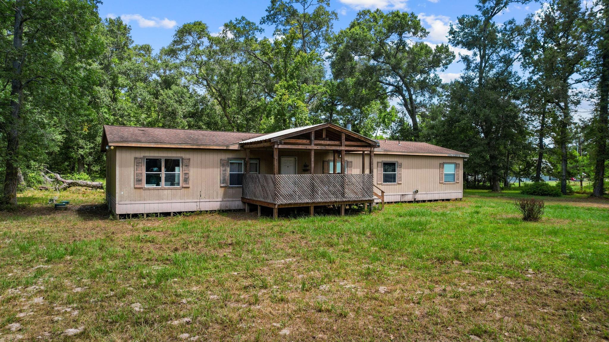 863 County Road 3141 E, Cleveland, TX 77327 photo