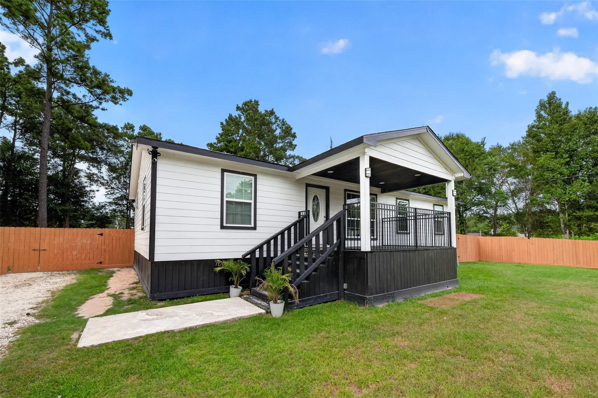 21673 County Road 3749d, Cleveland, TX 77327 photo