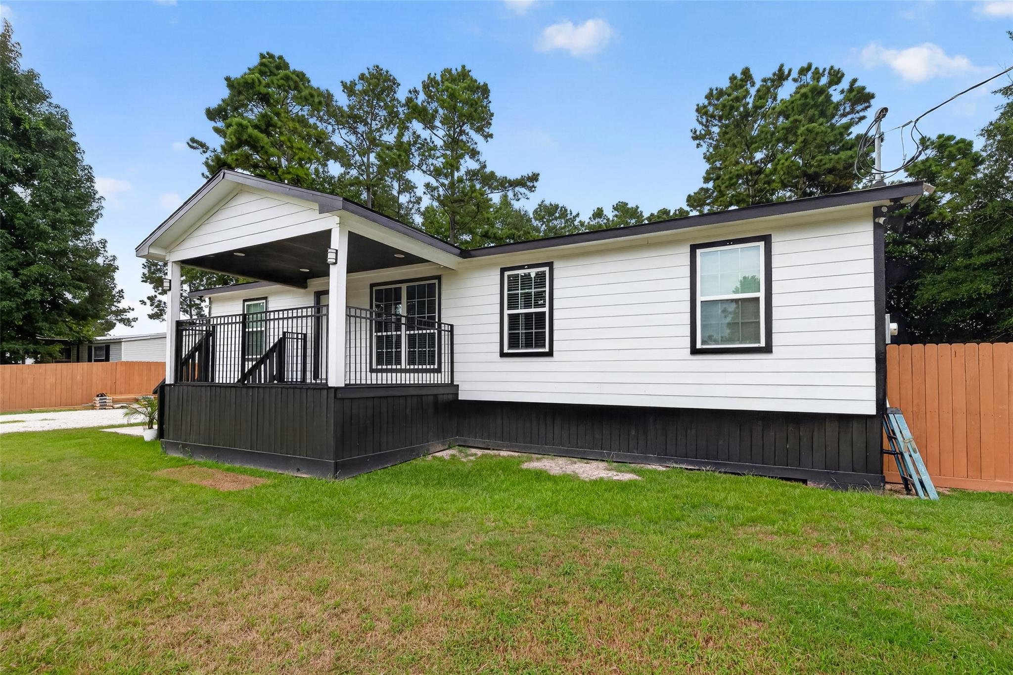 21673 County Road 3749d, Cleveland, TX 77327 photo
