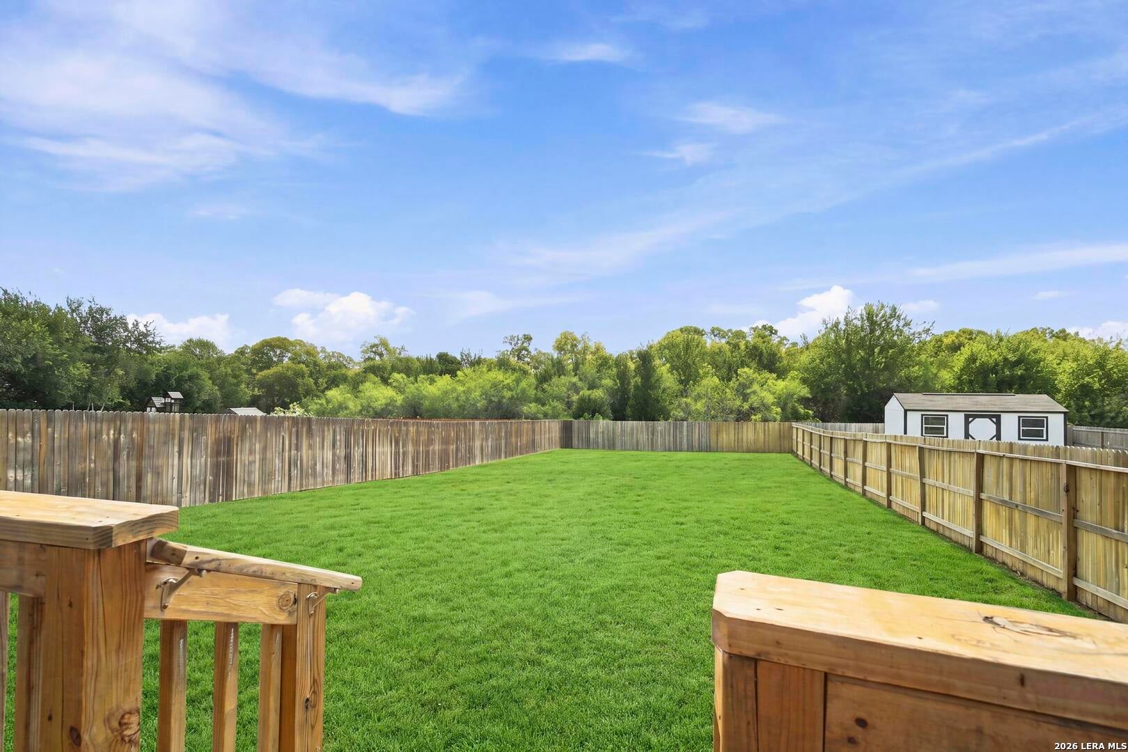 Backyard opening toward the greenbelt