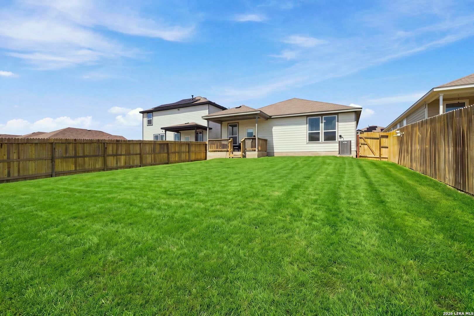 Rear exterior and established backyard