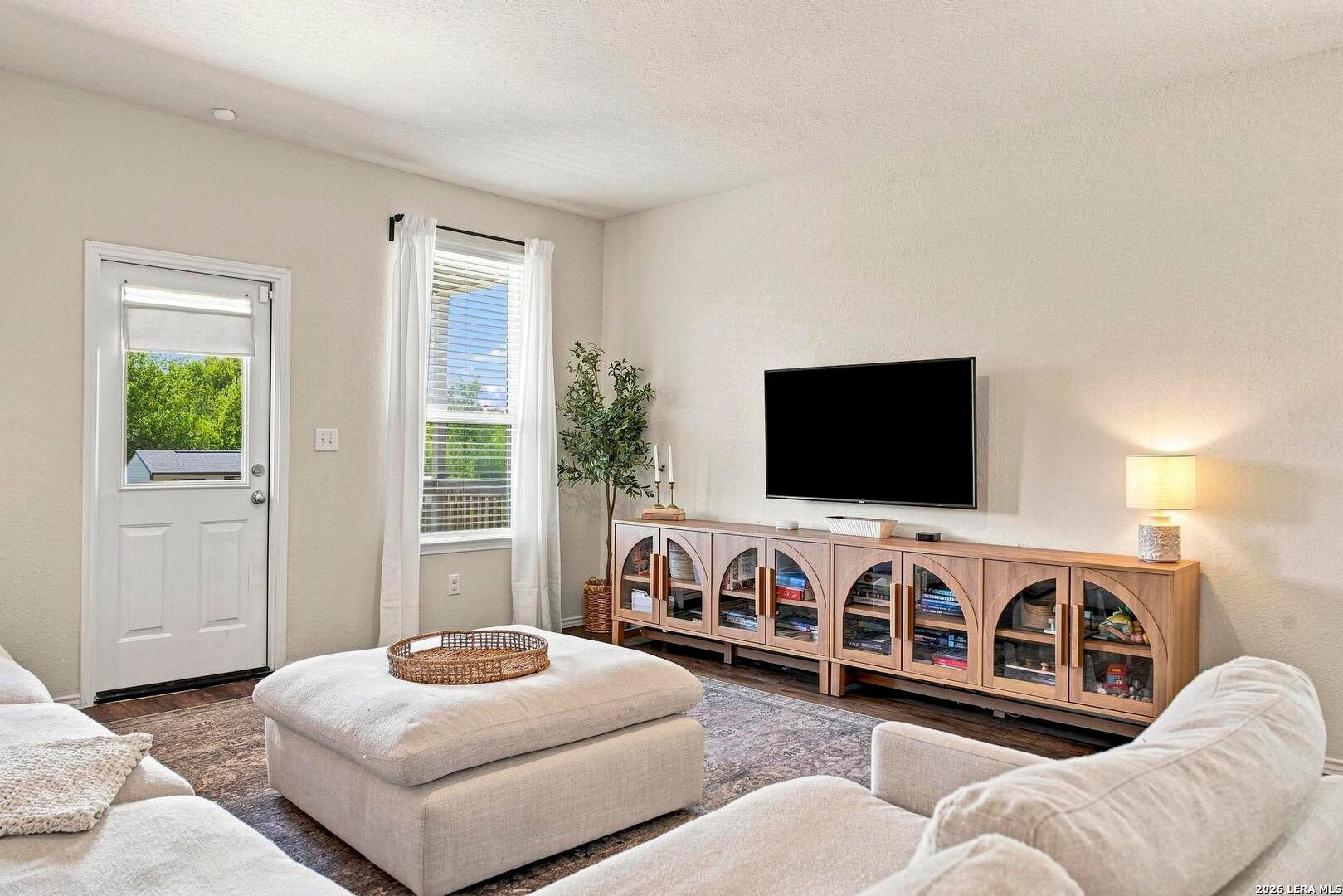 Living room seating area and media wall