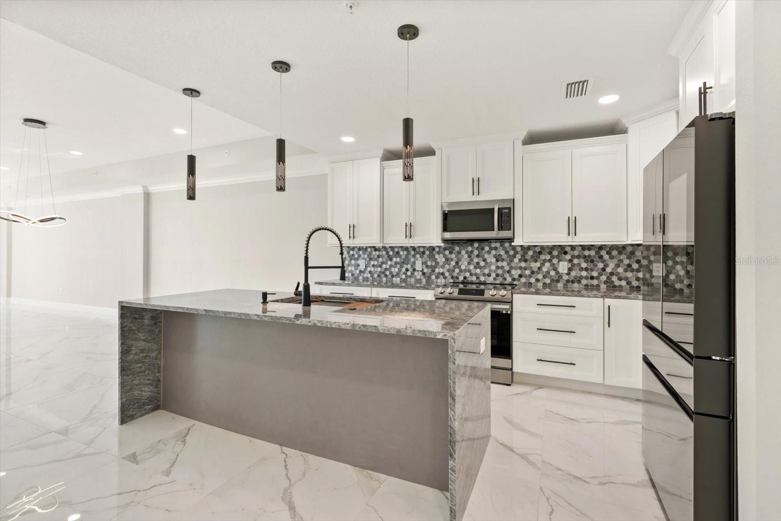 211 Dolphin Pt #401, Clearwater Beach, FL 33767 photo