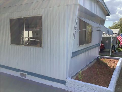 Manufactured Home in DADE CITY FL 34928 HAWKIOWA ROAD 4.jpg
